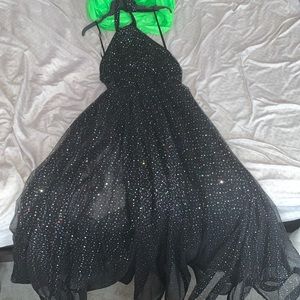 A black holographic prom dress